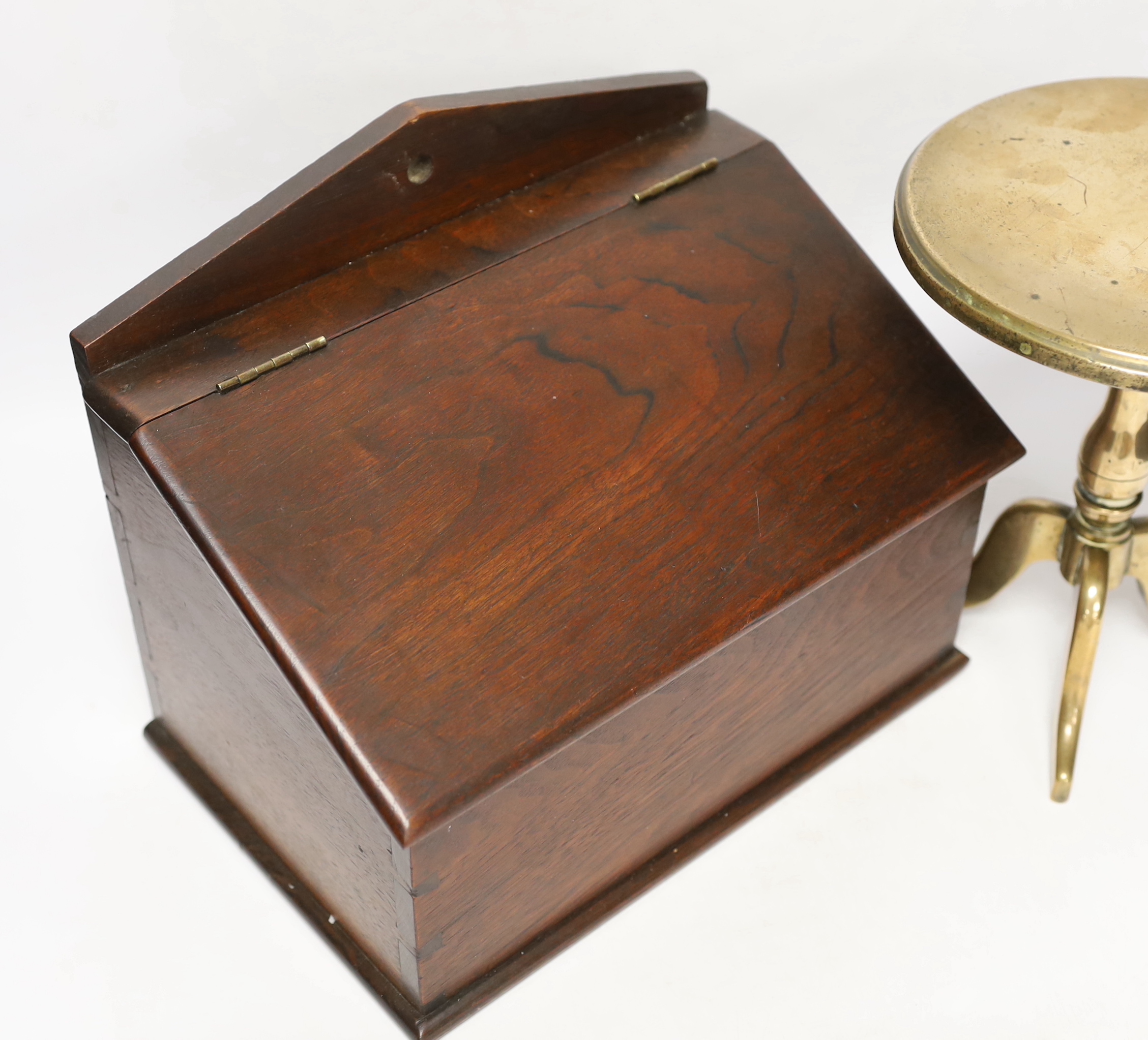 A Georgian brass trivet and a 19th century candle box, largest 27cm wide